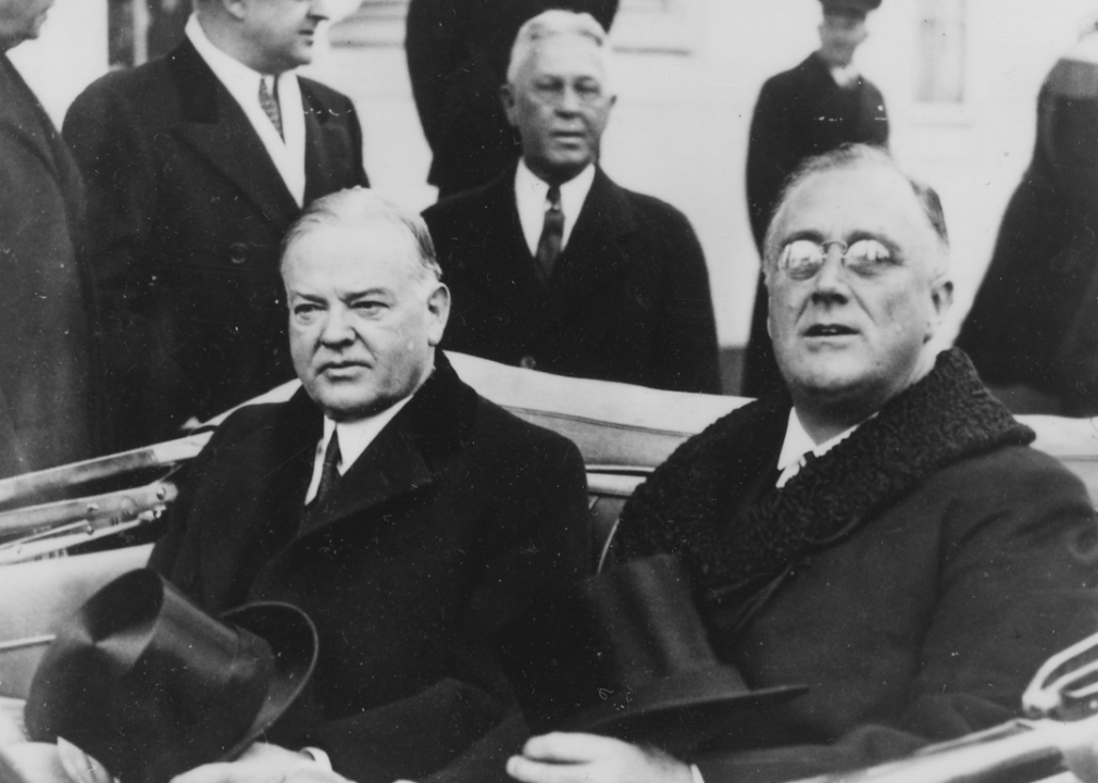 1933: Herbert Hoover and Franklin D. Roosevelt ride to the inauguration